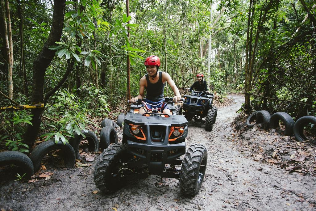 Sand & Sandals Desaru Beach Resort & Spa Eksteriør bilde ATV riding in the jungle